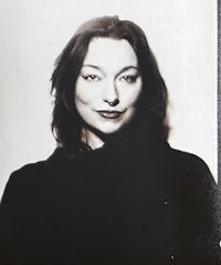 a black and white photo of a woman